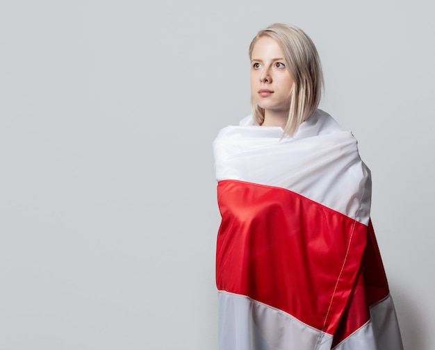 https://image.freepik.com/free-photo/woman-with-former-national-belarus-flag-white-wall_87910-7495.jpg