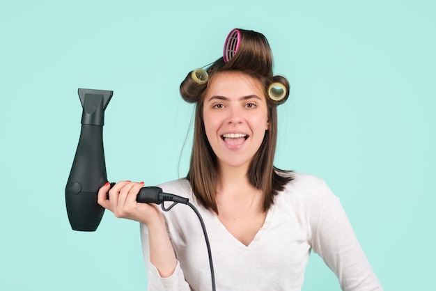 Premium Photo | Woman with hair dryer funny girl with straight hair ...