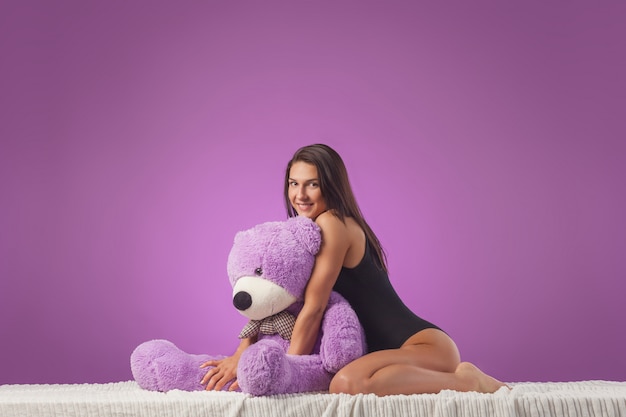 big teddy bear on bed