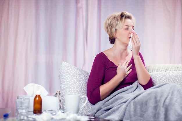 Premium Photo | Woman with short blond hair got the flu and coughing ...