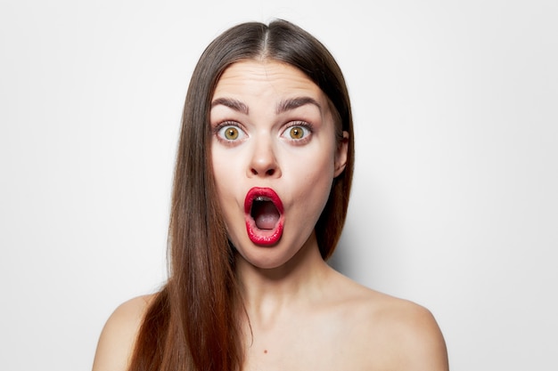 Premium Photo Woman With Surprised Facial Expression Wide Open Mouth Bared Shoulders