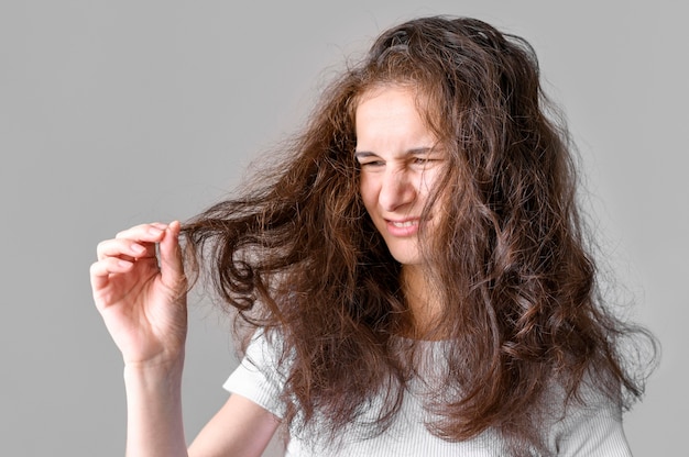 Woman with tangled hair | Free Photo