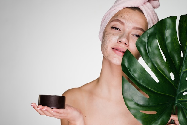 Premium Photo | A woman with a towel on her head after showering ...