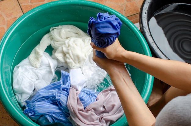 Premium Photo | Women washing clothes