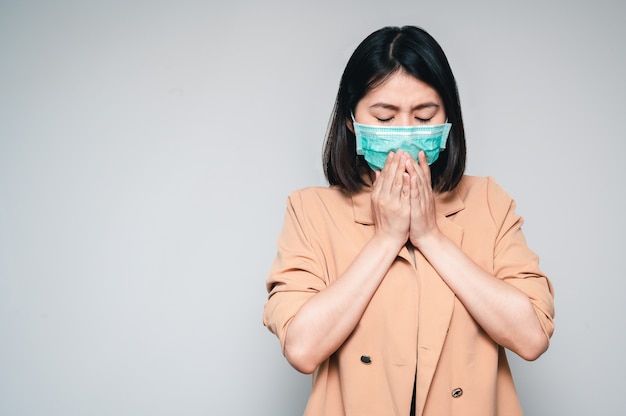 Premium Photo | Women wear face mask sneezing and coughing