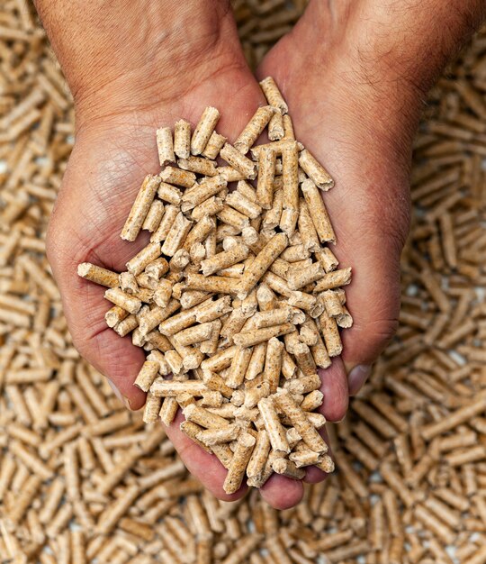 premium-photo-wood-pellets-in-hands