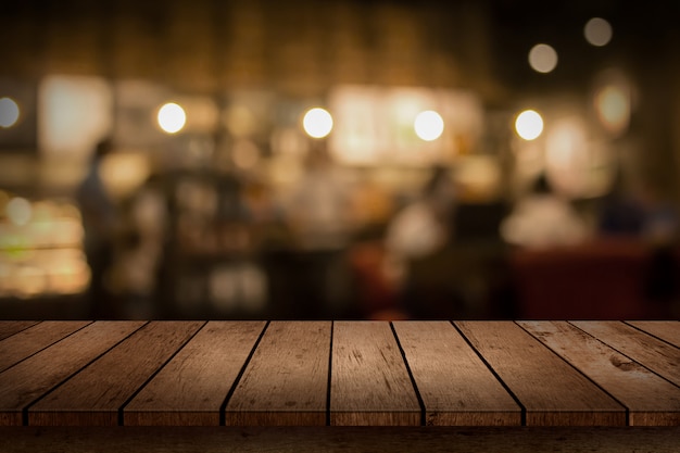 Premium Photo | Wood table top on bokeh coffee shop or cafe restaurant ...