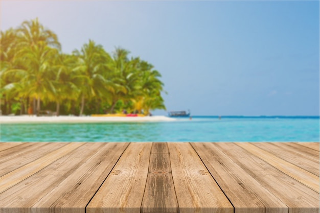 Wooden board empty table in front of blue sea & sky background. perspective wood floor over sea and sky - can be used for display or montage your products. beach & summer concepts. Free Photo