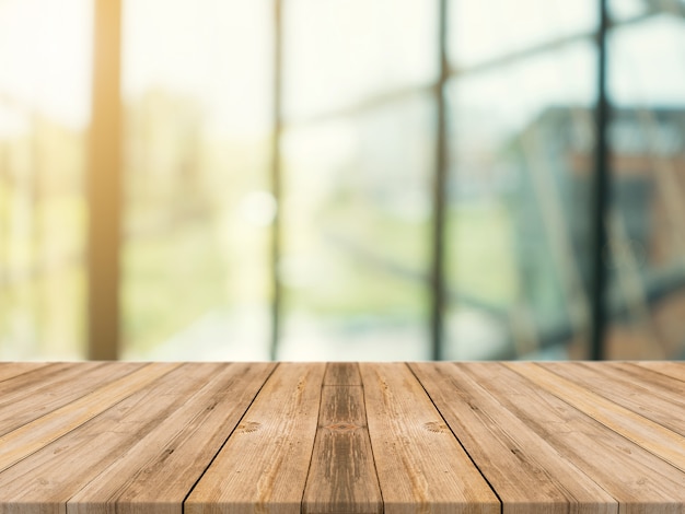 Wooden board empty table top on of blurred background | Premium Photo