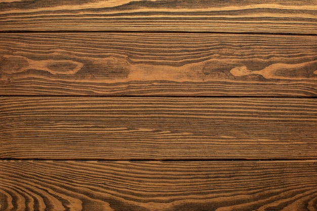 木製の茶色のレトロなぼろぼろの板の壁 テーブルまたは床のテクスチャバナーの背景 装飾のための木製の机の写真のモックアップの壁紙のデザイン プレミアム写真
