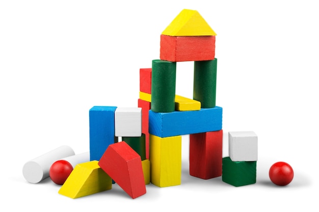 Premium Photo | Wooden building blocks on white background