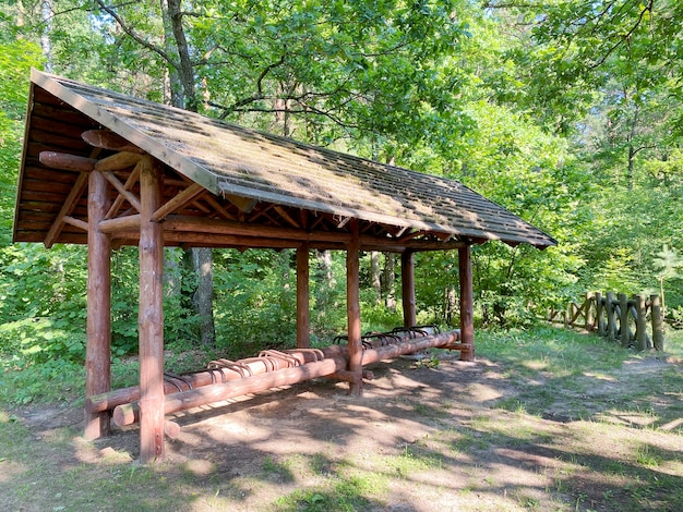 Premium Photo | Wooden gazebo for vacationing cyclists bicycle parking ...