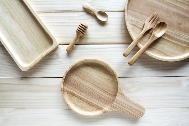 Premium Photo | Wooden kitchen utensils on wooden background