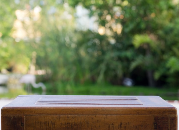 Wooden table at the garden | Premium Photo