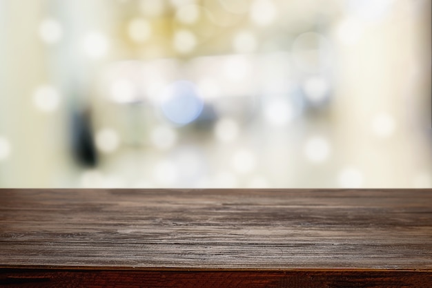 Premium Photo Wooden Table With Blurred Background