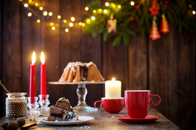 Premium Photo | Wooden table with christmas cake and decor