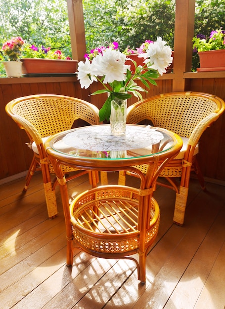 Premium Photo | Wooden Terrace With Chairs And Table