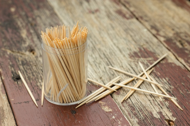 Premium Photo | Wooden toothpicks on wood table