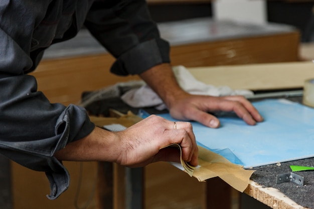 Woodworking workshop with machines, tools, devices for processing wood products. Premium Photo