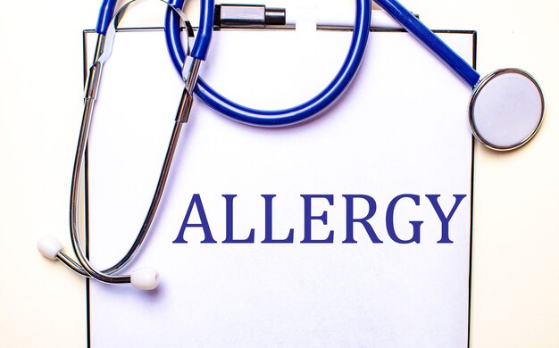 Premium Photo | The word allergy is written on a white sheet near the ...