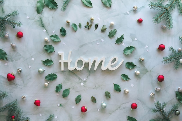 Download Word Home In Marble Circle Xmas Background With Natural Fir Twigs Holly Leaves And Glass Baubles Christmas Flat Lay In Grey Green Red Premium Photo PSD Mockup Templates