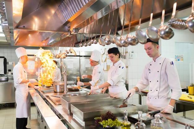 The work of the cook in the kitchen of the restaurant. Premium Photo