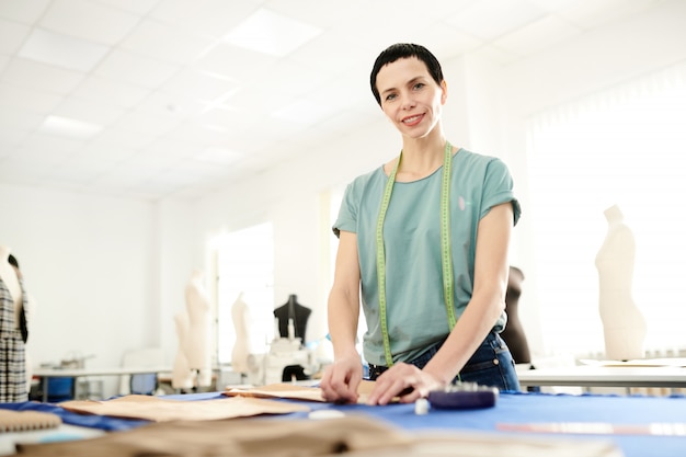 Premium Photo | Working in tailoring shop