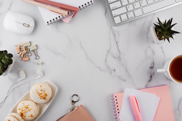 Free Photo | Workplace items on marble table above view