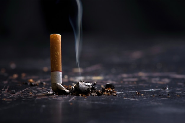 World no tobacco day concept stop smoking.tobacco cigarette butt on the floor Premium Photo