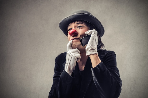 worried-clown-talking-phone_102671-5492.jpg