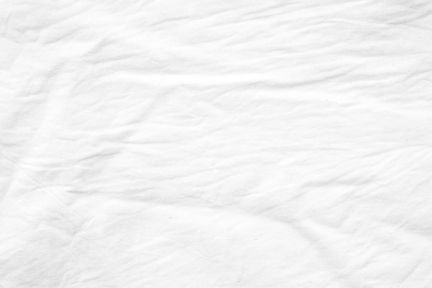 Premium Photo Wrinkled white cotton canvas fabric textured background, wallpaper