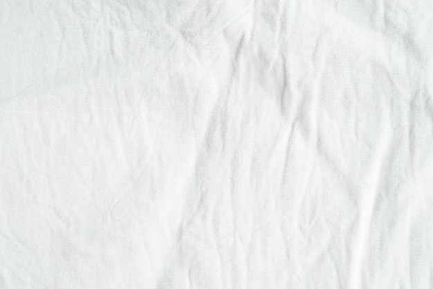 Premium Photo | Wrinkled white cotton canvas fabric textured background ...