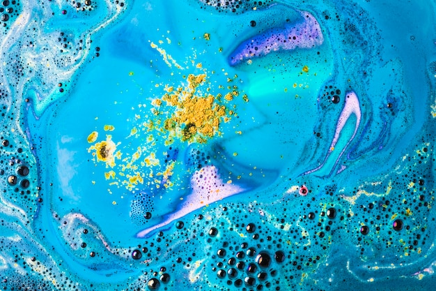 Free Photo | Yellow and blue bath bomb bubble dissolve backdrop
