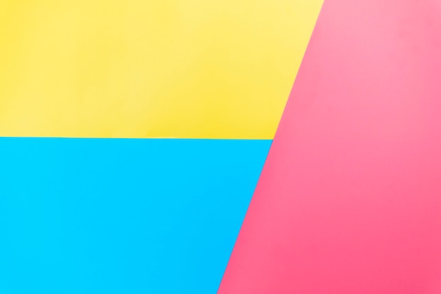 Premium Photo | Yellow, blue and pink backgrounds