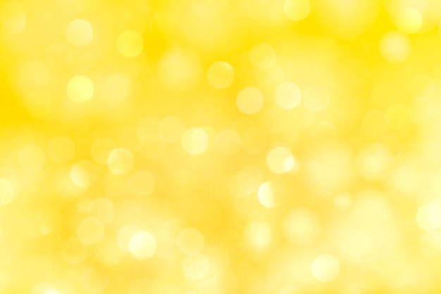 Premium Photo | Yellow bokeh patterned background