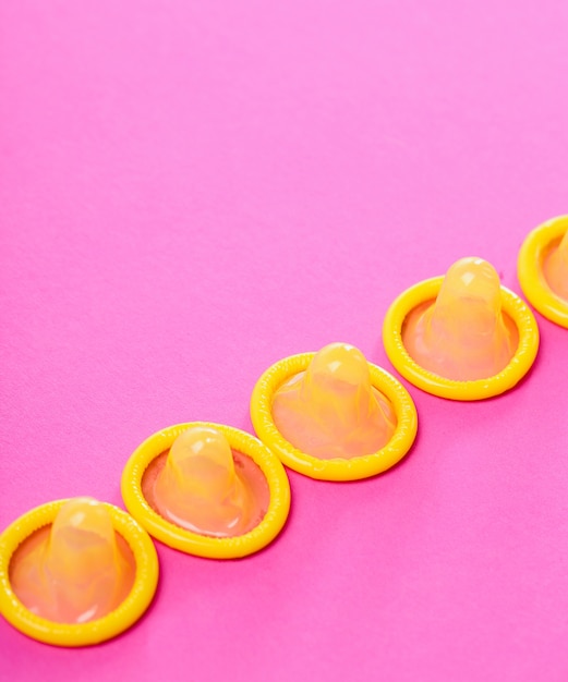 Free Photo | Yellow condoms