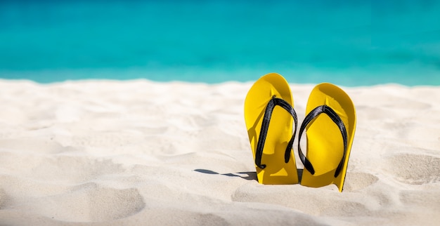 flip flops on the beach