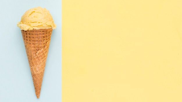 Download Free Photo Yellow Ice Cream In Wafer Cone On Blue And Yellow Background Yellowimages Mockups