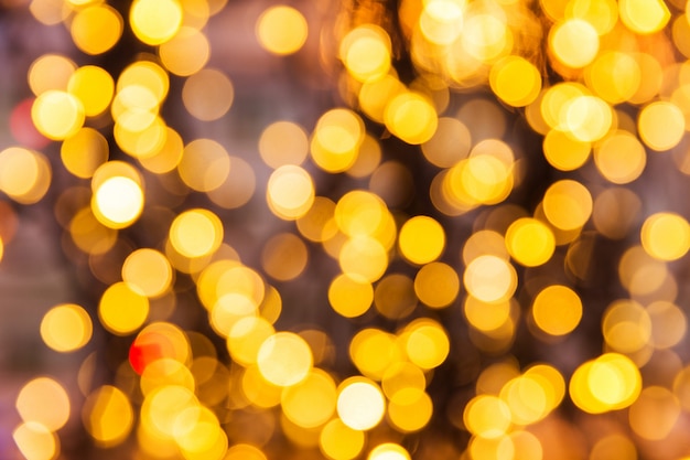 Premium Photo | Yellow lights bokeh texture. christmas lights blured