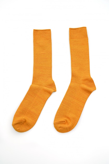 Premium Photo | Yellow mustard socks isolated