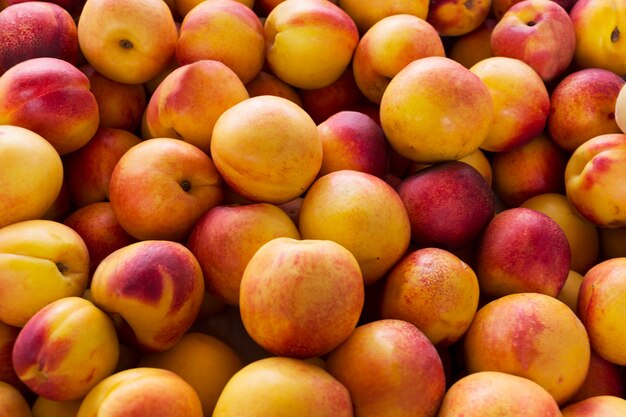 Premium Photo | Yellow nectarine background