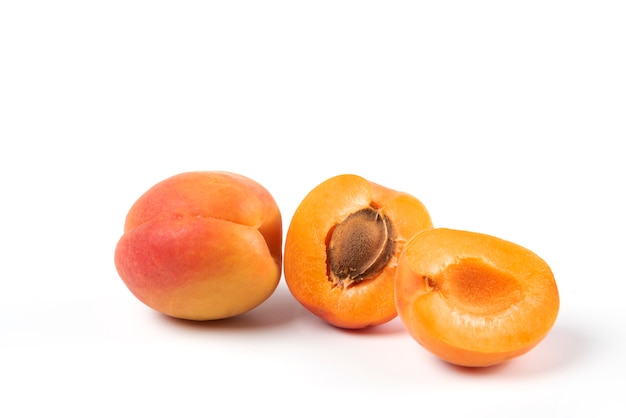 Free Photo | Yellow peaches isolated on white