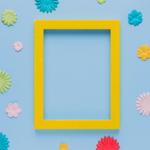 Download Free Photo Yellow Picture Frame Surrounded With Beautiful Flower Cutout PSD Mockup Templates