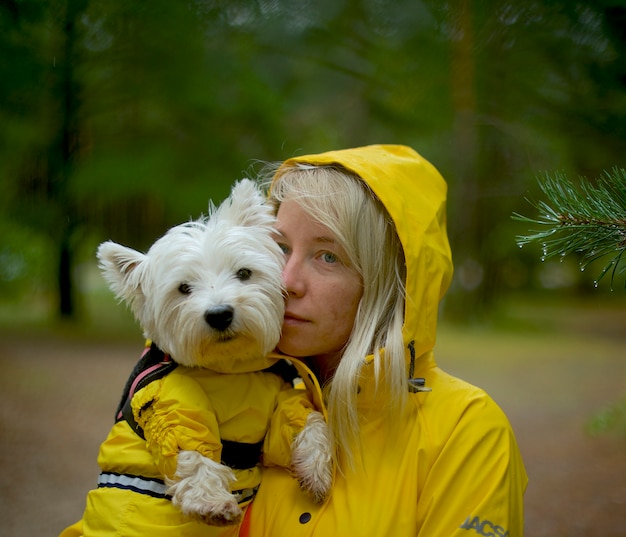 Premium Photo Yellow Raincoats For Dog And Lady