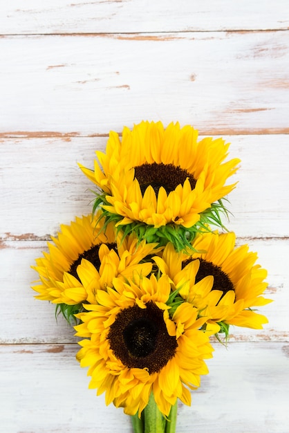 Yellow Sunflower Bouquet On White Rustic Background Premium Photo