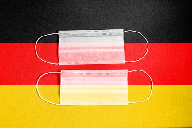 Download Free Photo Yellow Surgical Mask With Germany Flag PSD Mockup Templates