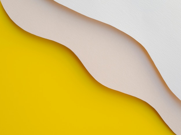 Yellow and white abstract paper waves Free Photo