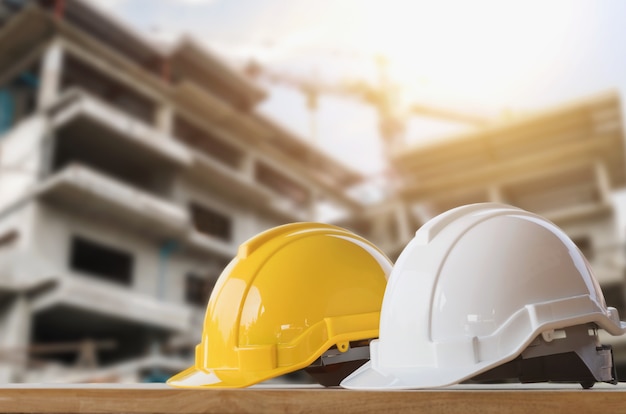 yellow-white-helmet-safety-construction-site_34152-531 İnşaat Malzemeleri Ankara