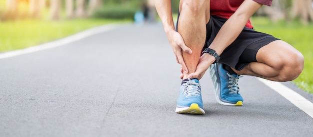 Premium Photo | Young adult male with his muscle pain during running.