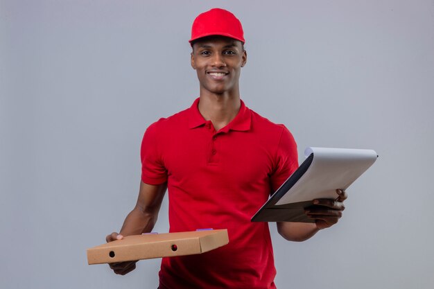 Download Free Young African American Delivery Man Wearing Red Polo Shirt And Cap Use our free logo maker to create a logo and build your brand. Put your logo on business cards, promotional products, or your website for brand visibility.